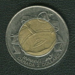 Монета шаман
